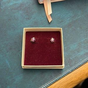 Yellow gold and amethyst stud earrings.